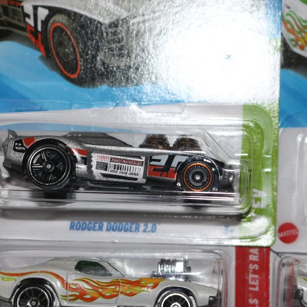Hot Wheels lot of 4 Rodger Dodger Let's Race and EV series all NIP
